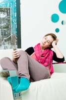 Girl listening to music, looking thoughtful